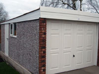 flat roof garage pvc with brick front 